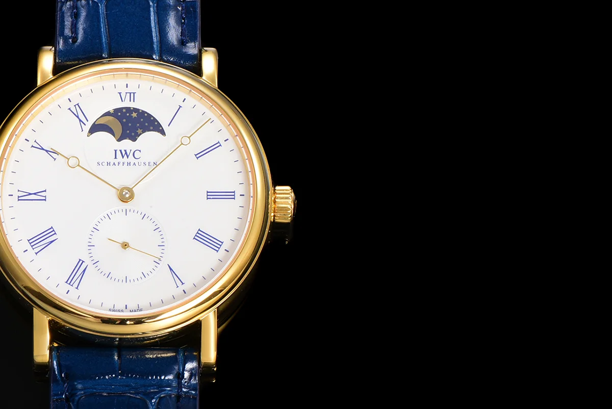 Portofino Hand Wound Moon Phrase IW5548 White Dial in Yellow Gold
