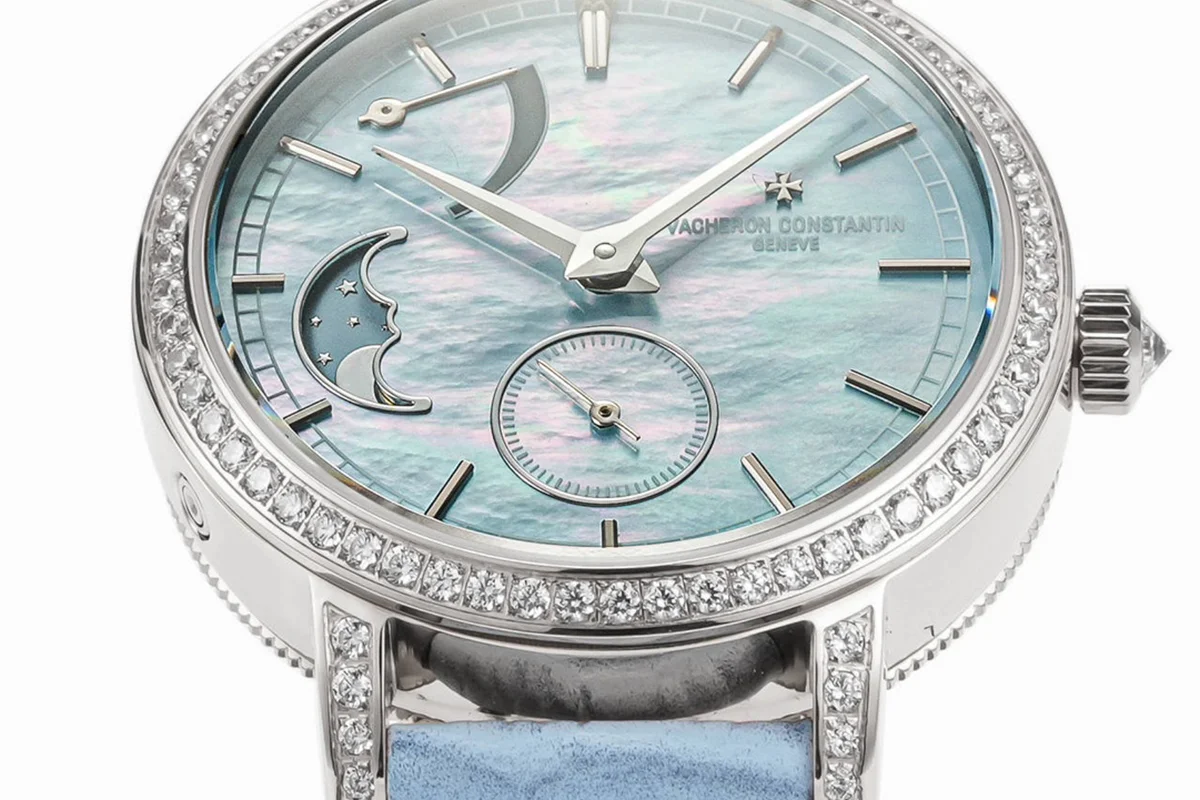 Traditionelle Moon Phase Blue MOP Dial with Diamond Bezel in White Gold on Blue Leather Strap
