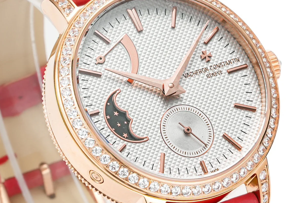 Traditionelle Moon Phase White Dial with Diamond Bezel in Pink Gold on Red Leather Strap