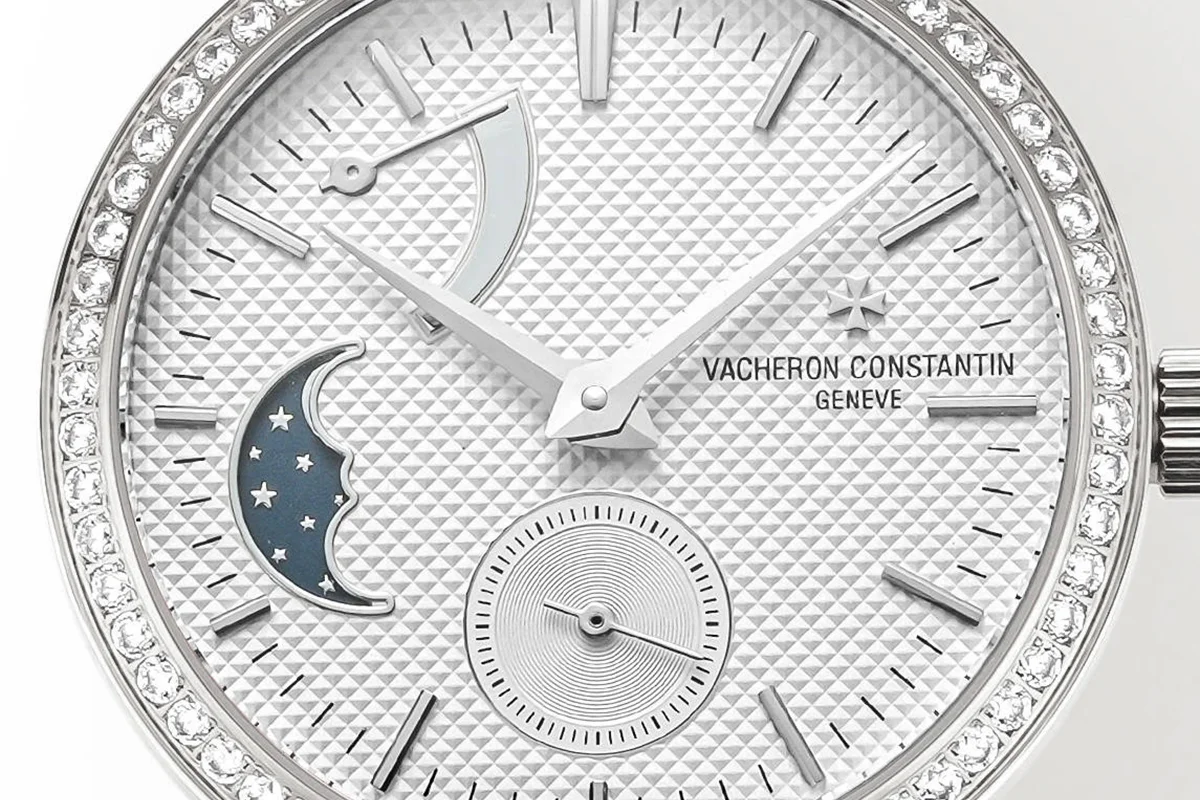 Traditionelle Moon Phase White Dial with Diamond Bezel in White Gold on Green Leather Strap