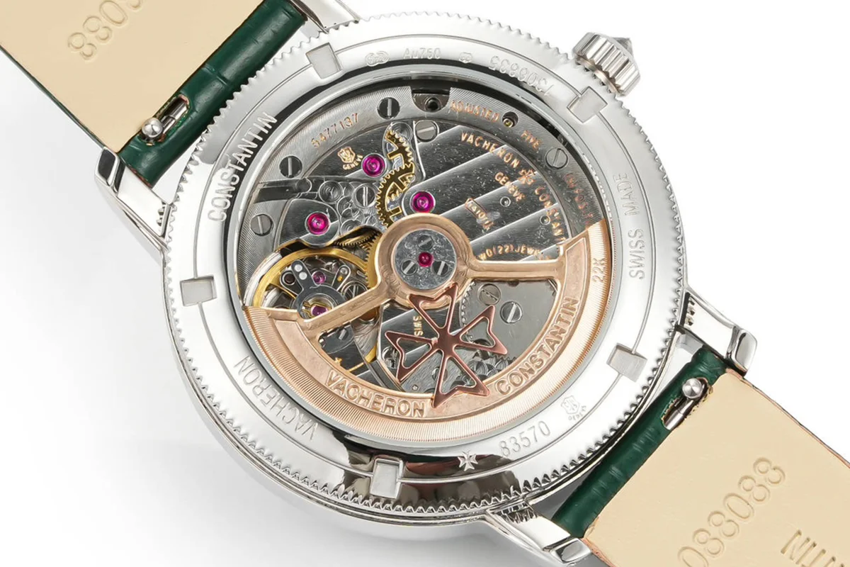 Traditionelle Moon Phase White Dial with Diamond Bezel in White Gold on Green Leather Strap